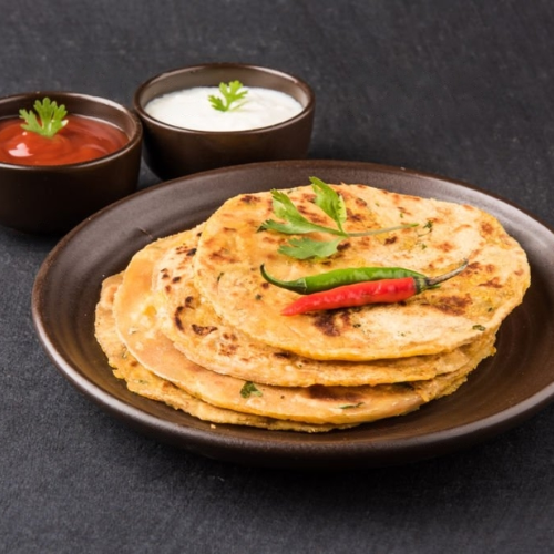 Aloo paratha (with curd and pickle)