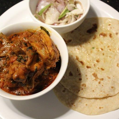 Roti with chicken curry